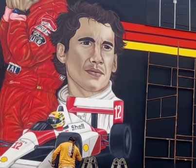 Arte sobre Rodas: Mural de 6 metros em homenagem a Ayrton Senna transforma fachada comercial em Lapão